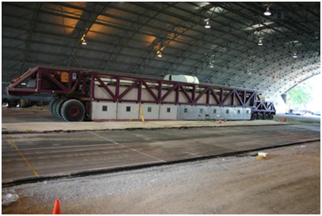 The Heavy Vehicle Simulator (HVS) tests asphalt pavement sections in the ERDC Pavement Testing Facility.