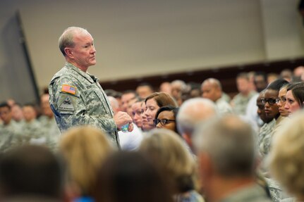 Chairman of the Joint Chiefs of Staff Gen. Martin E. Dempsey speaks with members of U.S. Southern Command staff  during a town hall at the U.S. Army Garrison-Miami Family & MWR Fitness Center where he answered questions on a wide range of topics Feb. 10, 2014. (DoD photo by Mass Communication Specialist 1st Class Daniel Hinton)