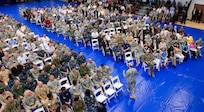 Chairman of the Joint Chiefs of Staff Gen. Martin E. Dempsey speaks with members of U.S. Southern Command staff  during a town hall at the U.S. Army Garrison-Miami Family & MWR Fitness Center where he answered questions on a wide range of topics Feb. 10, 2014. (DoD photo by Mass Communication Specialist 1st Class Daniel Hinton)