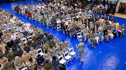 Chairman of the Joint Chiefs of Staff Gen. Martin E. Dempsey speaks with members of U.S. Southern Command staff  during a town hall at the U.S. Army Garrison-Miami Family & MWR Fitness Center where he answered questions on a wide range of topics Feb. 10, 2014. (DoD photo by Mass Communication Specialist 1st Class Daniel Hinton)