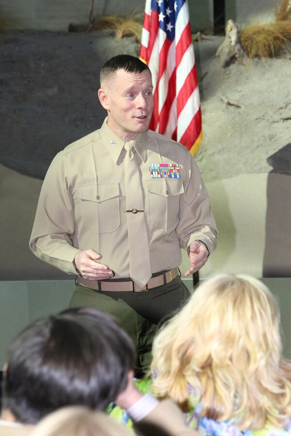 Col. David Maxwell, commanding officer of Marine Corps Base Quantico, delivers opening remarks during a Combined Federal Campaign awards ceremony at the National Museum of the Marine Corps on Jan. 29, 2014. Nine units received awards for their participation during the 2013 campaign.