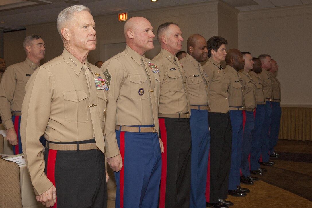 Gen. James F. Amos, the 35th Commandant of the Marine Corps, and Sgt. Maj. Micheal P. Barrett, the 17th Sergeant Major of the Marine Corps, attend the Marine Corps Recruiting Command FY14 Superior Achiever Awards Ceremony at the Crowne Plaza in Old Town Alexandria, Va., Feb. 11, 2014. (U.S. Marine Corps photo by Lance Cpl. Alejandro Sierras/Released) 

