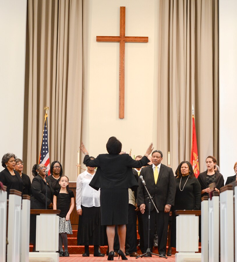 Men, women and children from the Dumfries Little Union Baptist Church sing the gospel at the Marine Memorial Chapel aboard Marine Corps Base Quantico for the 20th Annual Gospel Sing on Feb. 8, 2014.