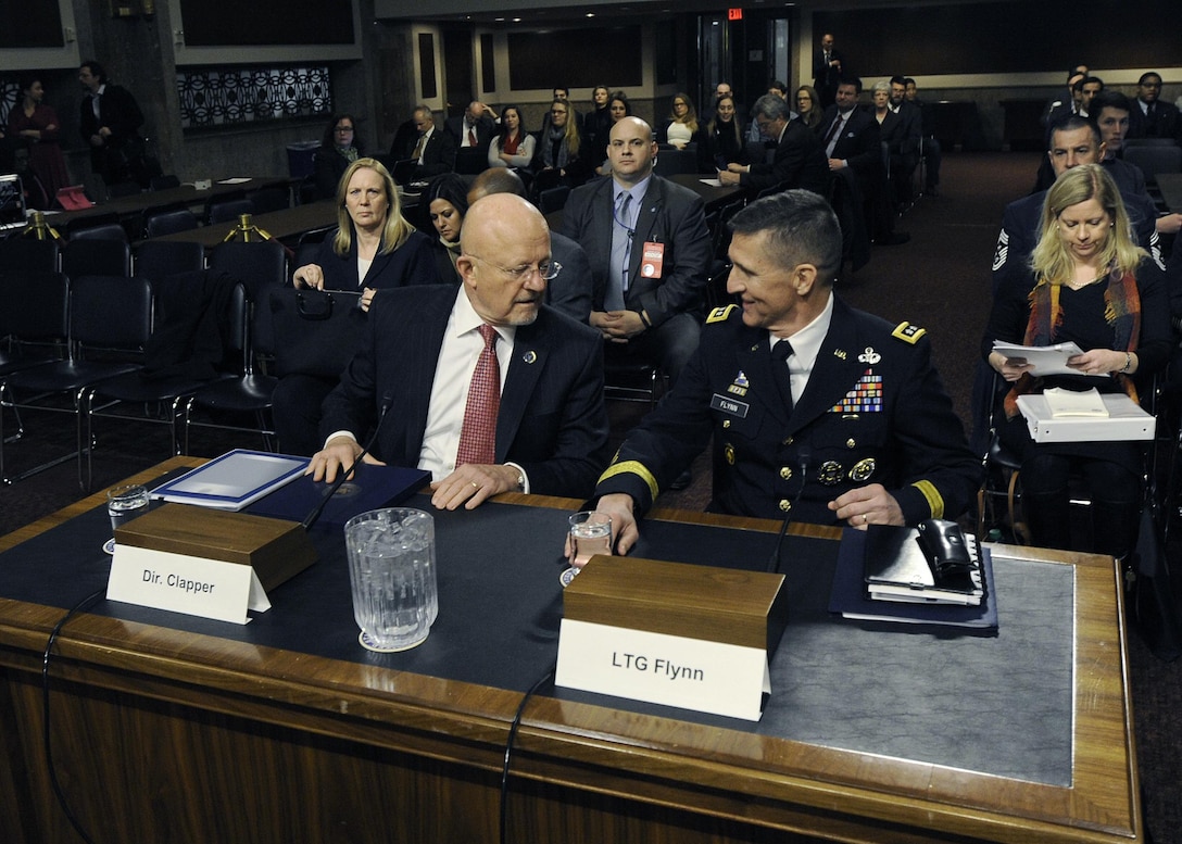 Director of National Intelligence James Clapper and DIA Director Army Lt. Gen. Michael Flynn prepare for their joint testimony Feb. 11 on current and future worldwide threats.