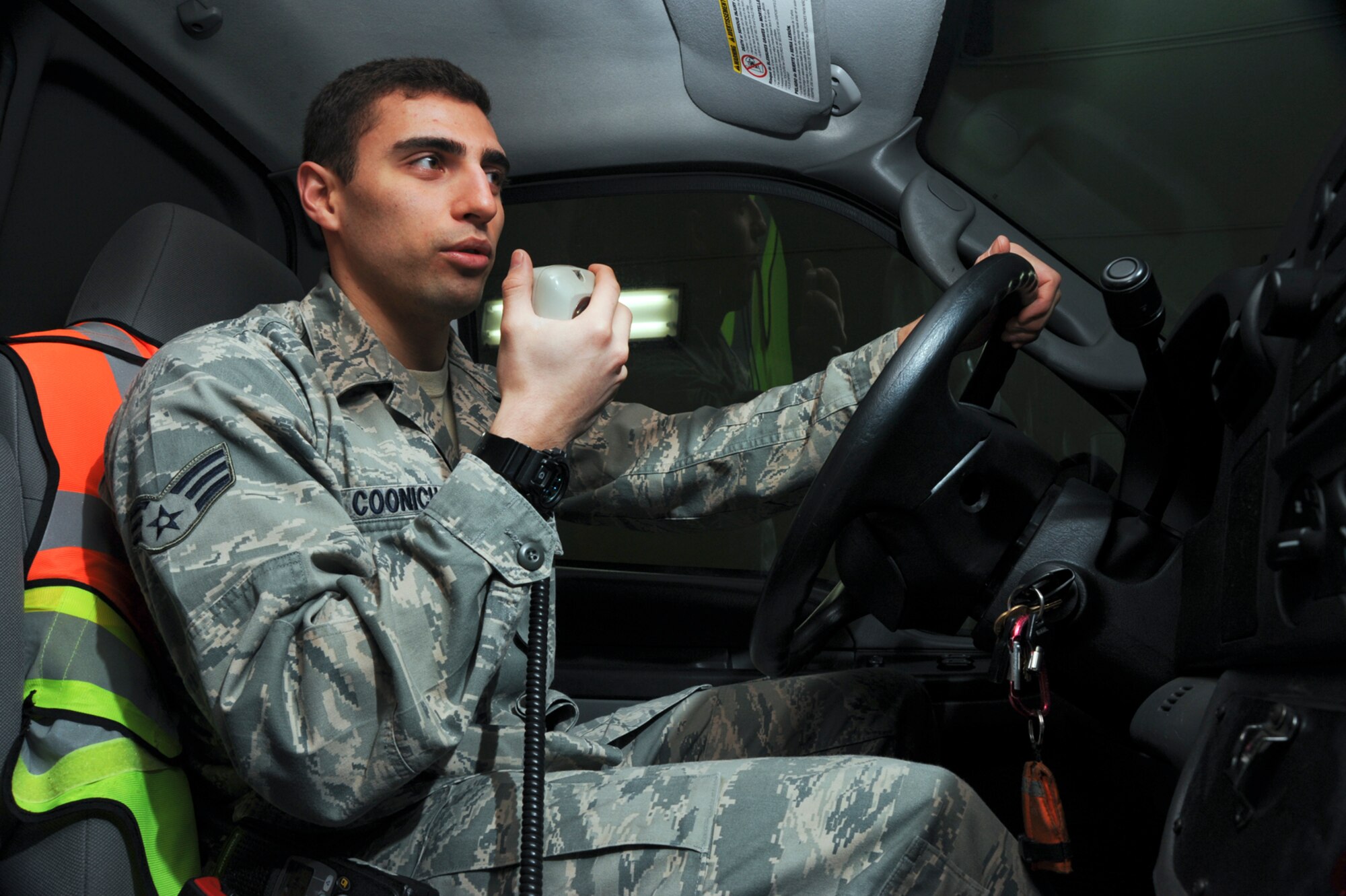 Senior Airman Joshua Coonich, 35th Medical Operations Squadron aerospace medical technician, speaks through an ambulance radio at Misawa Air Base, Japan, Feb. 11, 2014. Coonich, a native of Schaumburg, Ill., is this week's Wild Weasel of the Week. Each week a member of the 35th Fighter Wing is selected as the Wild Weasel of the Week. This individual is recognized based on superior performance, outstanding work ethic, and overall good conduct and discipline. (U.S. Air Force photo/Staff Sgt. Alyssa C. Wallace)


