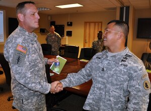 U.S. Army Command Sgt. Maj. William B. Zaiser, U.S. Southern Command Senior Enlisted Advisor, spent the day at Soto Cano Air Base, Feb. 11, 2014. Zaiser received a mission briefing from U.S. Army Col. Thomas Boccardi, Joint Task Force-Bravo Commander, as well as a base tour from U.S. Army Command Sgt. Maj. Norriel Fahie, Army Support Activity. Following a lunch with enlisted members of the Task Force, Zaiser spent the afternoon meeting with senior enlisted leaders and members of Joint Task Force-Bravo's Army Forces Battalion, Joint Security Forces, 1-228th Aviation Regiment, and 612th Air Base Squadron.  (U.S. Air Force photo by Capt. Zach Anderson)