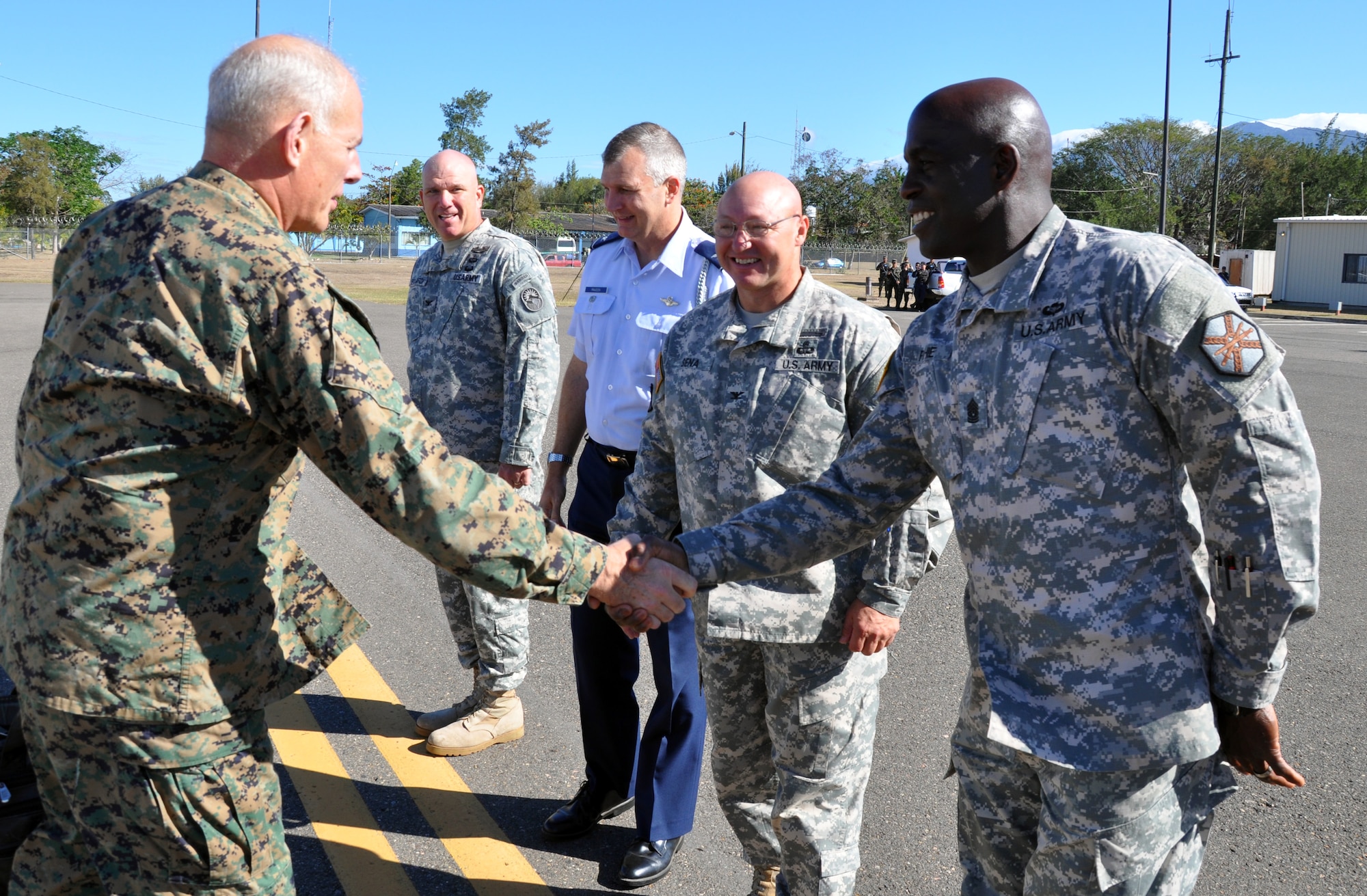 U.S. Marine Corps Gen. John F. Kelly, Commander, U.S. Southern Command, is greeted on the flightline by Joint Task Force-Bravo leadership upon his arrival at Soto Cano Air Base, Honduras, Feb. 11, 2014. Kelly is visiting Honduras during the week to meet with U.S. and Honduran military and civilian leaders. (U.S. Air Force photo by Capt. Zach Anderson)