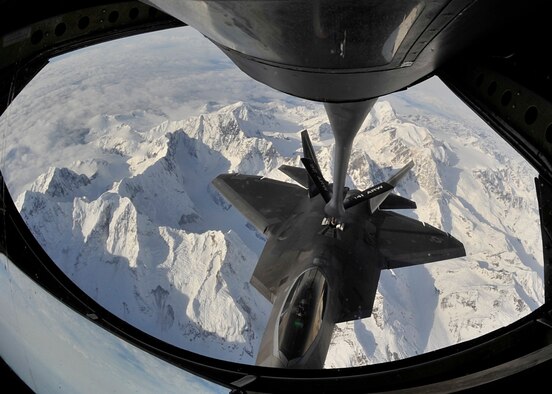  F-22 Raptor from Hill Air Force Base, Utah, prepares to be refueled by a KC-135 Stratotanker assigned to Fairchild AFB, Wash., Feb. 7, 2014. The KC-135 Stratotanker provides the core aerial refueling capability for the U.S. Air Force and has filled this role for more than 50 years. (U.S. Air Force photo/Senior Airman Mary O'Dell)