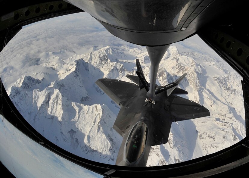 An F-22 Raptor from Hill Air Force Base, Utah, prepares to be refueled by a KC-135 Stratotanker assigned to Fairchild AFB, Wash., Feb. 7, 2014. The KC-135 Stratotanker provides the core aerial refueling capability for the U.S. Air Force and has filled this role for more than 50 years. (U.S. Air Force photo by Senior Airman Mary O'Dell/Released)