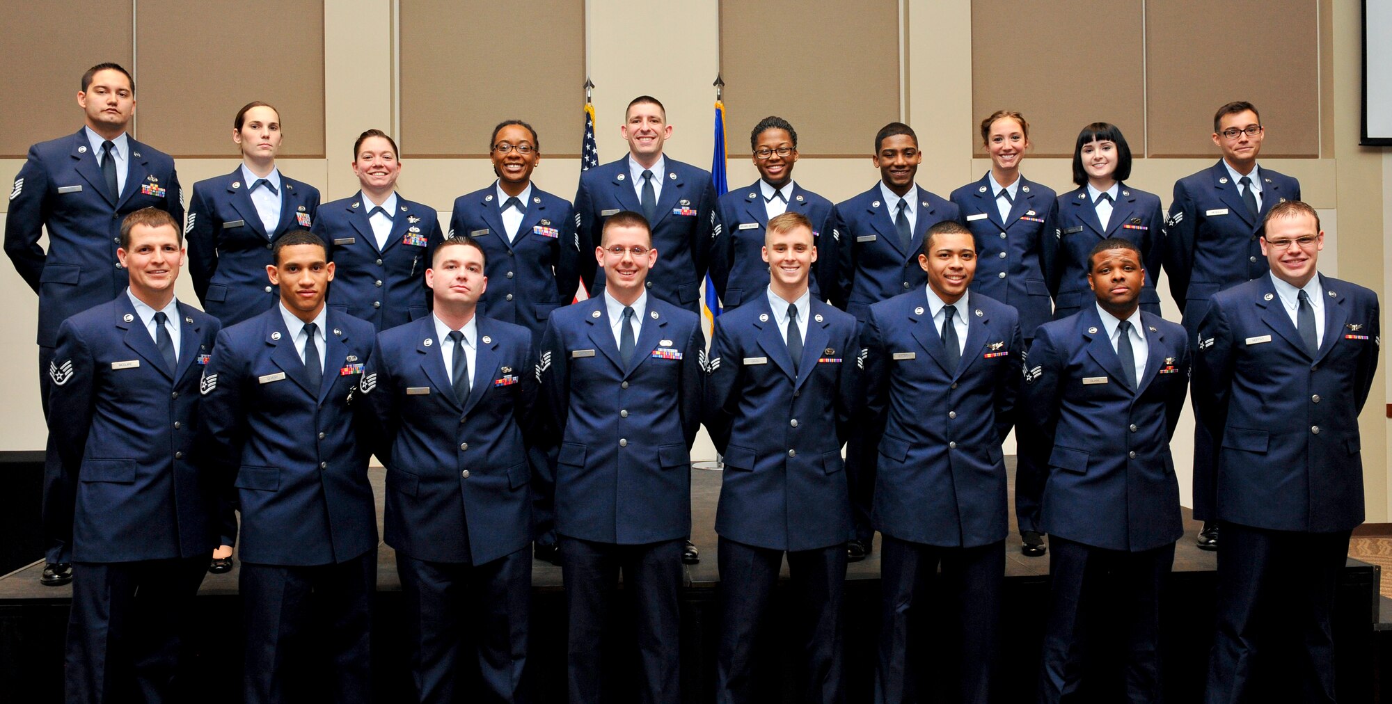 Eighteen Team Buckley members were promoted to their next ranks Feb. 11, 2014, at the Leadership Development Center at Buckley Air Force Base, Colo. A promotion ceremony is an Air Force tradition allowing co-workers, family and friends to congratulate Airmen on their promotion. (U.S. Air Force photo by Airman 1st Class Samantha Saulsbury/Released)