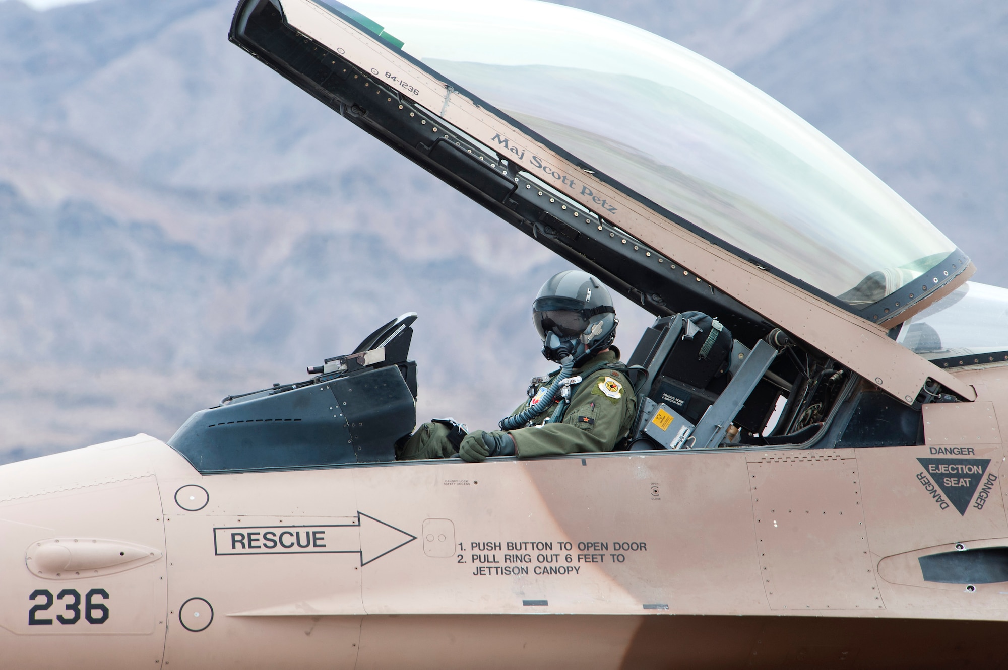 Capt. Alex Winn, 64th Aggressor Squadron F-16 pilot, prepares to start his aircraft engine prior to a Red Flag 14-1 training mission Feb. 6, 2014, at Nellis Air Force Base, Nev. Red Flag provides Airmen from U.S. and allied countries an opportunity to experience realistic combat scenarios to prepare and train for possible future conflicts or war. (U.S. Air Force photo by Lorenz Crespo)