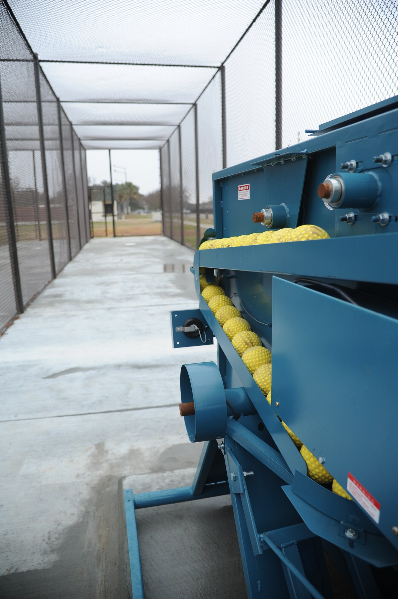 Batting cages sit behind the softball fields on Ploesti Drive with equipment inside for free use by anyone Feb. 11, 2014, at Keesler Air Force Base, Miss.  The batting cages are one of the Commander-in-Chief’s Installation Excellence Award projects.  (U.S. Air Force photo by Kemberly Groue)