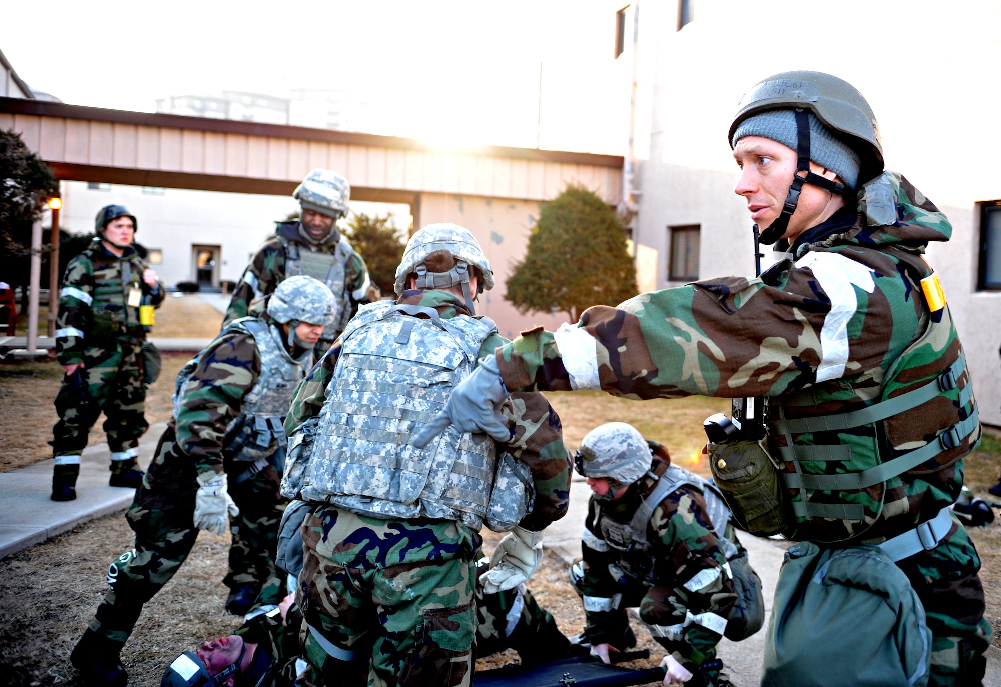 A member of the 51st Medical Group Field Response Team directs the separation of simulated casualties into “immediate” and “delayed” categories at the casualty collection point as part of a mass casualty scenario outside Bldg. 938 during Operational Readiness Exercise Beverly Midnight 14-02 at Osan Air Base, Republic of Korea, Feb. 11, 2014. Role players were then tagged to allow emergency room personnel to simulate treating the most critically injured first upon their arrival at the 51st MDG. (U.S. Air Force photo/Airman 1st Class Ashley J. Thum)