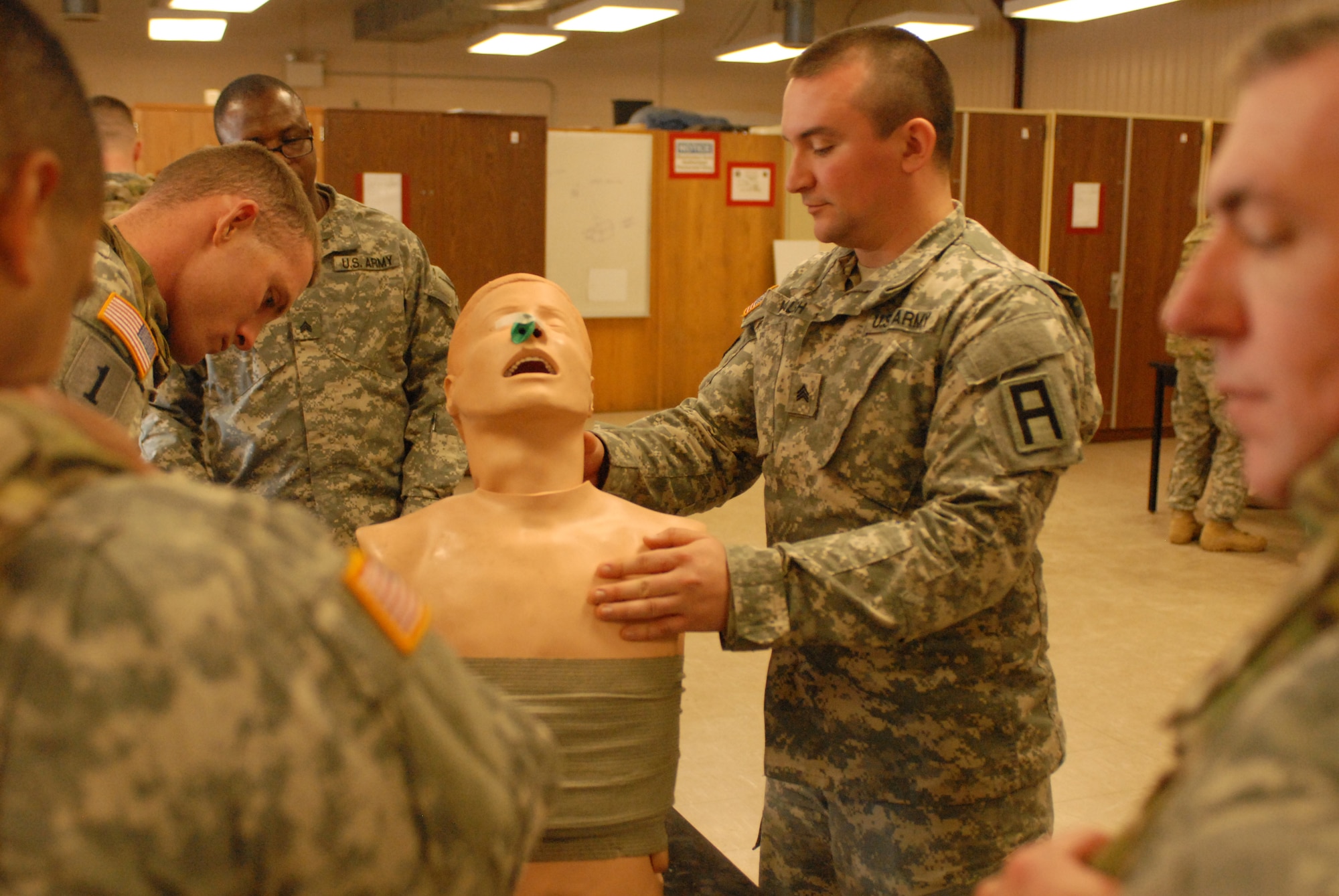 Combat Lifesaver Course student, Sgt. Timothy M. Walsh, 28, Springfield, Mass., treating a tension pneumothorax (sucking chest wound), the second leading cause of preventable death on the battlefield Jan. 24, 2014, at Joint Base McGuire-Dix-Lakehurst, N.J. The three-day course was designed to teach any Soldiers the basic medical skills needed to save lives in combat, when a Combat Medic isn't present. (U.S. Army photo by Capt. Kelvin Scott/Released)