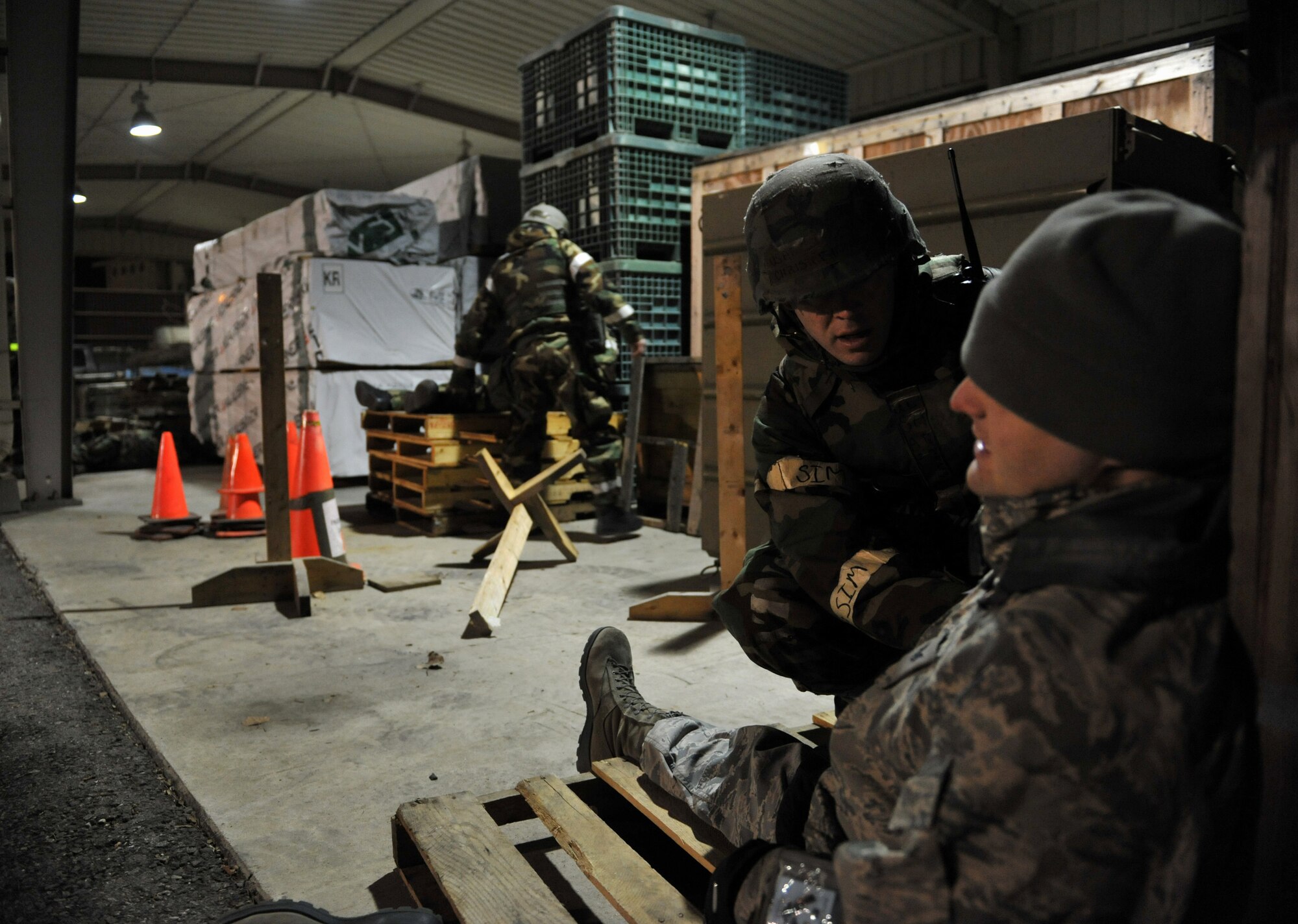 A member of the 51st Logistics Readiness Squadron Traffic Management Office triage team checks on the consciousness of a simulated explosion casualty during Beverly Midnight 14-02 at Osan Air Base, Republic of Korea, Feb. 11, 2014. The triage team tended to the wounds of five different role players during this particular exercise scenario. (U.S. Air Force photo/Senior Airman Siuta B. Ika)