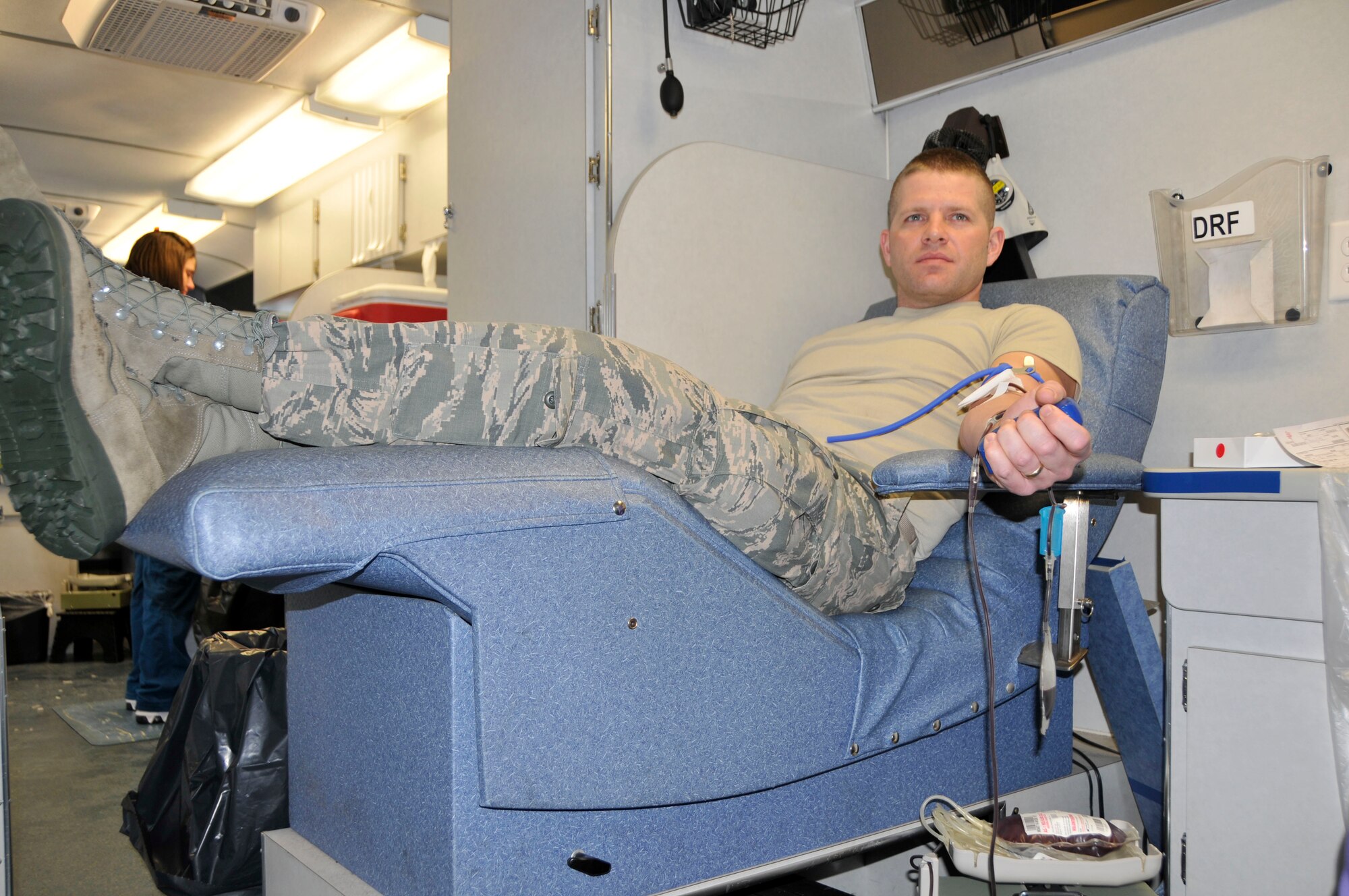 U.S. Air Force Tech. Sgt. Brian Chesshir, 181st Intelligence Wing, Indiana Air National Guard donates the gift of life during the February 2014 Blood Drive, Hulman Field, Terre Haute, Ind.  Supporting the community is a key mission for the 181 IW as part of the Air National Guard. (U.S. Air National Guard photo by Senior Master Sgt. John S. Chapman/Released)