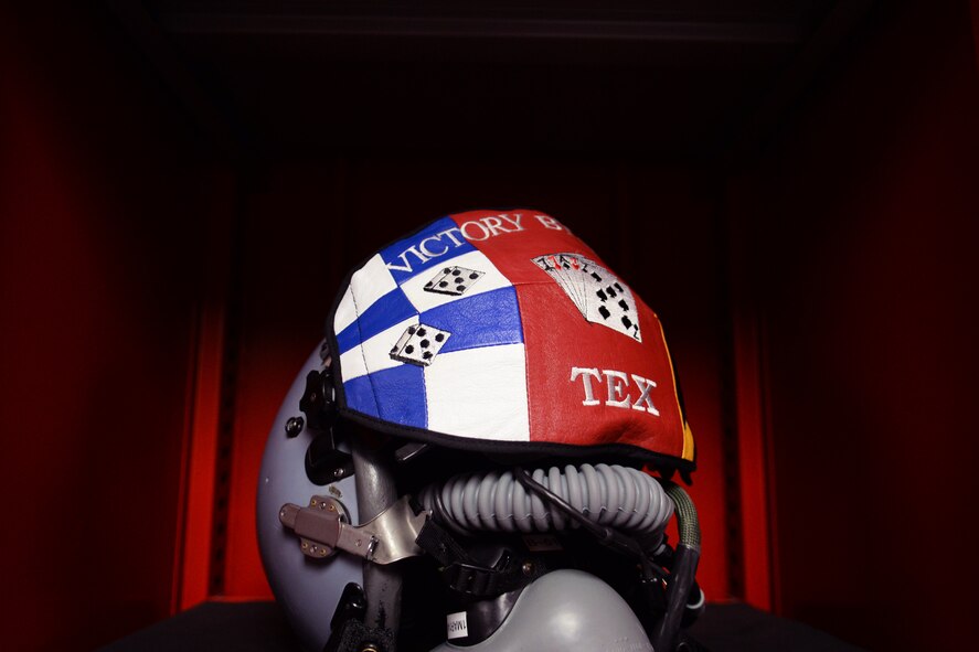 A fighter pilot helmet is stored in a pilot’s locker in the 77th Fighter Squadron, Shaw Air Force Base, S.C., Feb. 11, 2014. Maintaining helmets is just one facet of aircrew flight equipment Airmen’s job. (U.S. Air Force photo by Airman 1st Class Jonathan Bass/Released)