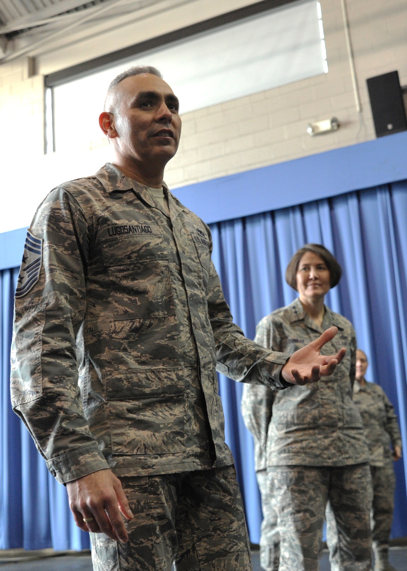 Air Force District of Washington Command Chief Master Sgt. Jose LugoSantiago and AFDW Commander Maj. Gen. Sharon K. G. Dunbar thank members of the U.S. Air Force Honor Guard for their hard work and professionalism at Joint Base Anacostia-Bolling, D.C., Feb. 7, 2014. The USAF Honor Guard originated in 1948 when Headquarters Command, U.S. Air Force, directed the creation of an elite ceremonial unit. (U.S. Air Force photo/Master Sgt. Tammie Moore)