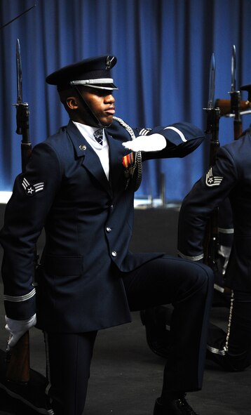 Senior Airman Malcolm Davis III, U.S. Air Force Honor Guard Drill Team member, runs through a drill routine with his team at Joint Base Anacostia-Bolling, D.C., Feb. 7, 2014. The USAF Drill Team training is an eight-week training course that teaches Airmen the fundamentals of precision drill. (U.S. Air Force photo/Master Sgt. Tammie Moore)