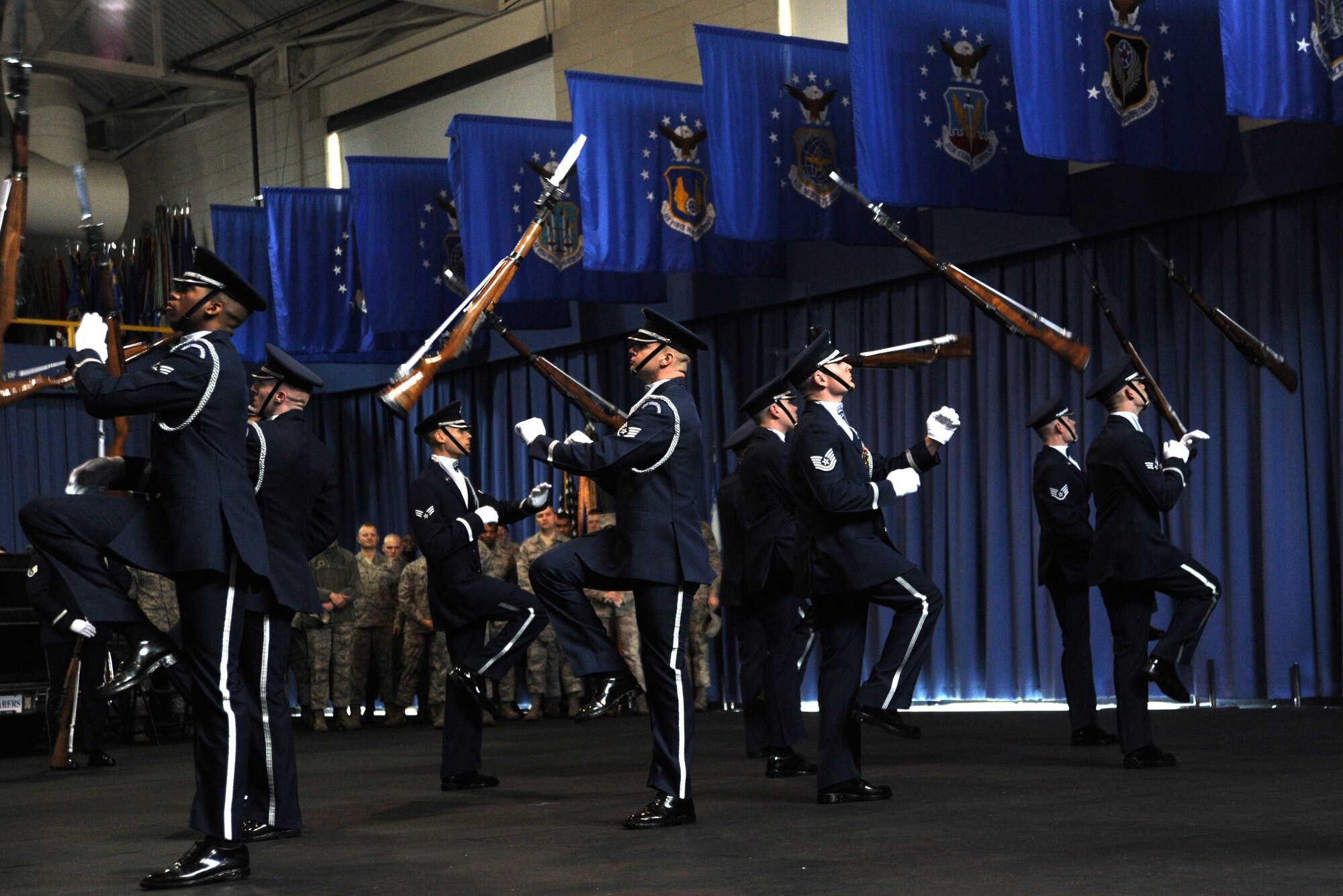 Members of the U.S. Air Force Honor Guard Drill Team run through their routine at Joint Base Anacostia-Bolling, D.C., Feb. 7, 2014. A standard USAF Drill Team performance features a professionally choreographed sequence of show-stopping weapon maneuvers, precise tosses, complex weapon exchanges and a walk through the gauntlet of spinning weapons. (U.S. Air Force photo/Master Sgt. Tammie Moore)