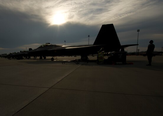 In the early hours of the morning, maintenance personnel prepare Tyndall’s F-22 Raptors for a day of sorties at the Savannah Combat Readiness Training Center, 165th Airlift Wing, Savannah Air National Guard, Savannah, Ga. Tyndall deployed more than 200 members to Savannah for Sentry Savannah 2014, a joint-force deployment exercise. (U.S. Air Force photo by Senior Airman Christopher Reel)