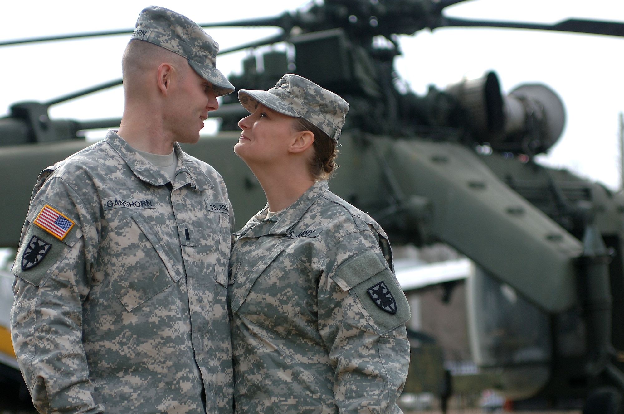 U.S. Army 1st Lt. Andrew Ganshorn, 508th Transportation Company detachment officer, and his wife, Sgt. Stephanie Ganshorn, 155th Inland Cargo Transfer Company, 53rd Transportation Battalion, 7th Transportation Brigade (Expeditionary) load planner, met at the Exchange at Fort Eustis, Va. in 2006. Ever since exchanging vows June 22, 2006, the Ganshorns have worked together to raise their three children and spend as much time together as possible. (U.S. Air Force photo by Senior Airman Teresa Aber/Released)
