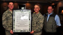 Military Saves is a social marketing campaign to persuade, motivate, and encourage military families to save money every month. Col. Alex Mezynski, 5th Bomb Wing commander and Col. Robert Vercher, 91st Missile Wing commander participate in the 2014 Military Saves Proclamation signing at Minot Air Force Base Feb. 7, 2014, to help promote financial awareness. (U.S. Air Force photo/ Senior Airman Kristoffer Kaubisch)  