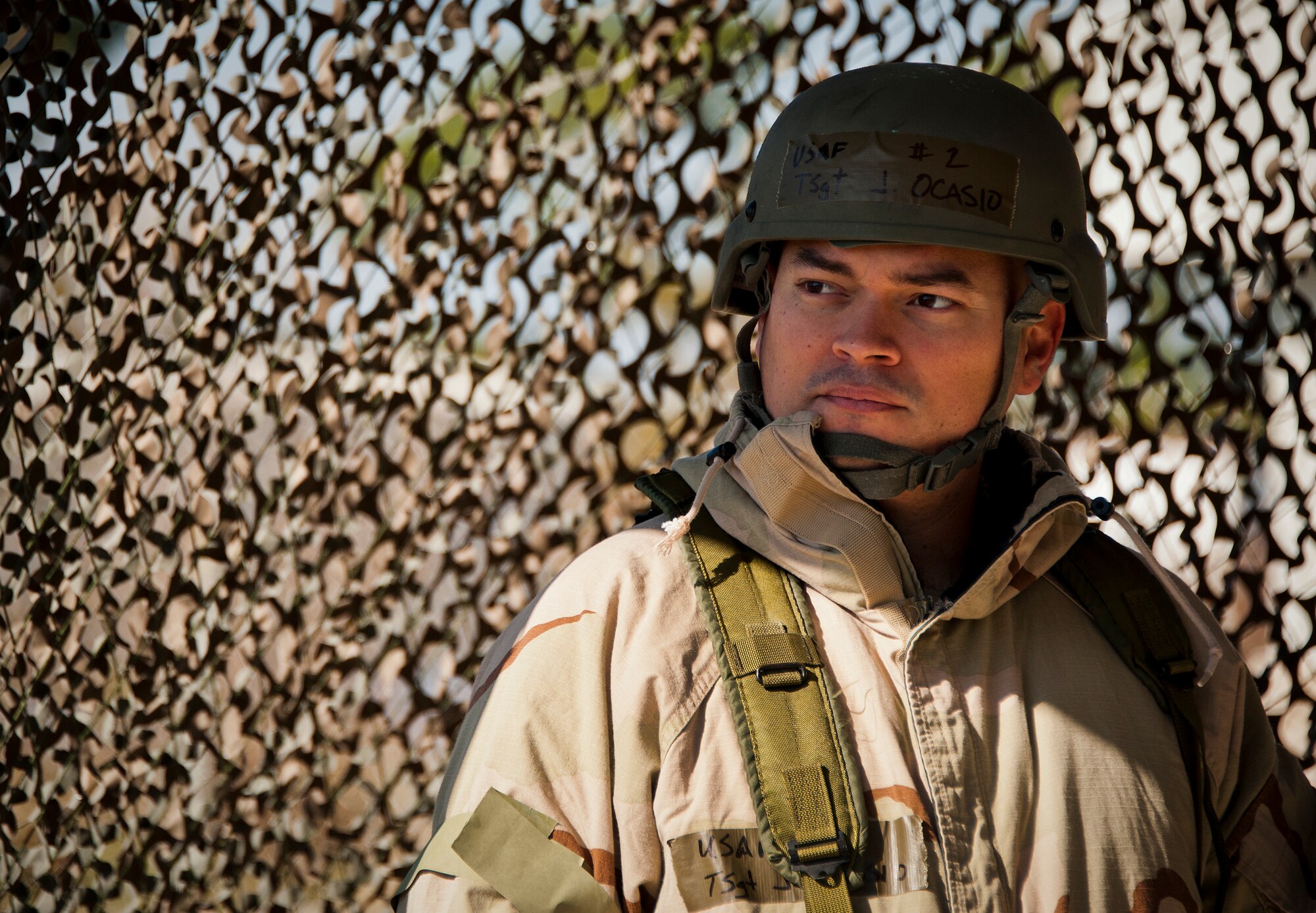 Tech Sgt. Jalil Ocasio, of the 96th Comptroller Squadron, awaits further instruction during the field training portion of a Phase II exercise Feb. 7 at Eglin Air Force Base, Fla. A Phase II evaluates an Airman’s ability to meet wartime and contingency taskings of employing the force, sustaining the force and the ability to survive and operate. More than 70 potential deployers received the classroom and practical field training during a series of 96th Test Wing exercises occurring all week. (U.S. Air Force photo/Sara Vidoni)