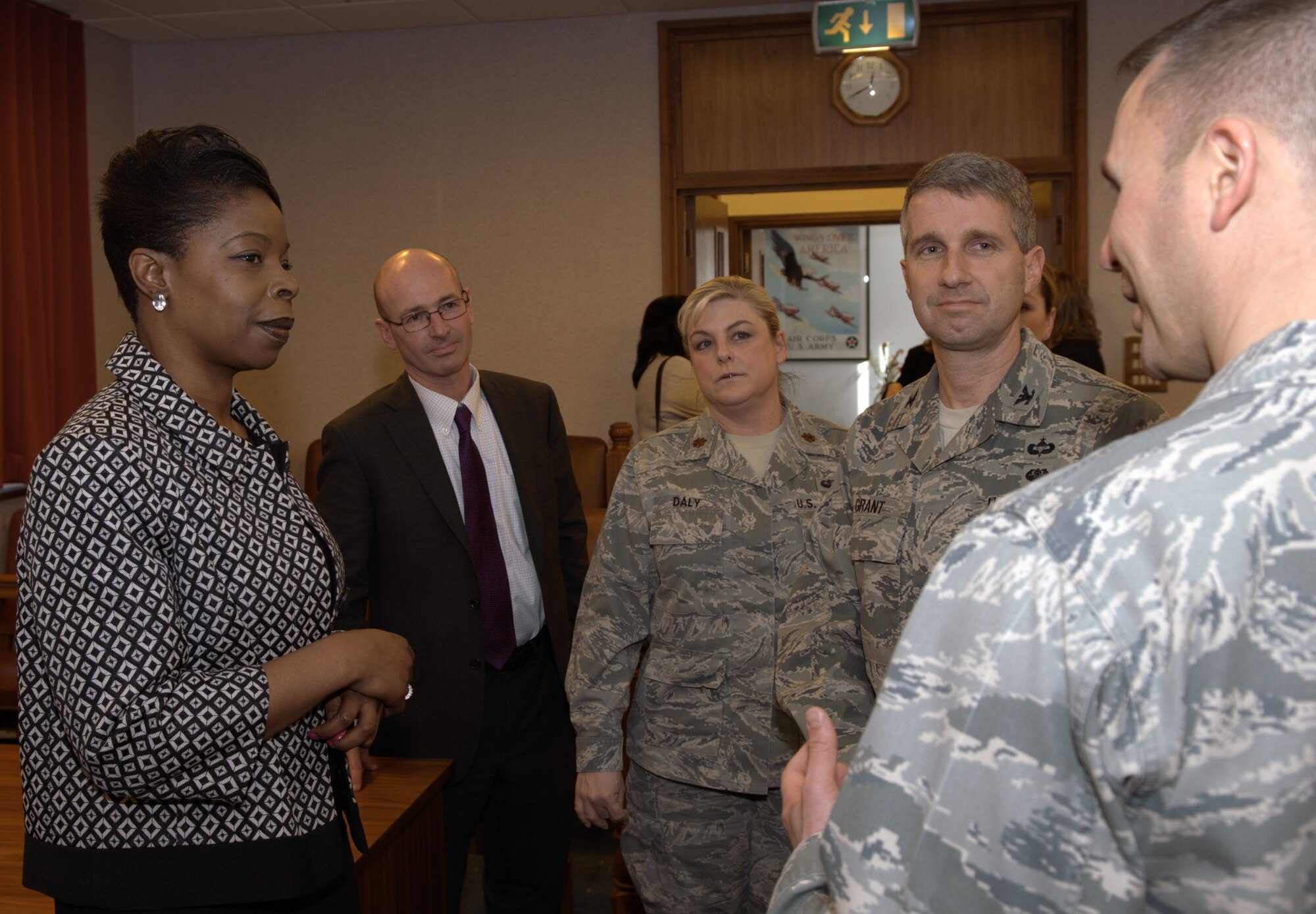 Grace Ononiwu, left, East of England Chief Crown Prosecutor, meets with U.S. Air Force legal personnel Feb. 2, 2014, on RAF Mildenhall, England. Ononiwu received a base tour and met with base leadership and U.S. Air Forces in Europe-U.K. legal representatives. This meeting helped Ononiwu gain an understanding of Team Mildenhall’s mission and the unique situations its legal team faces. (U.S. Air Force photo by Airman 1st Class Jonathan Light/Released)
