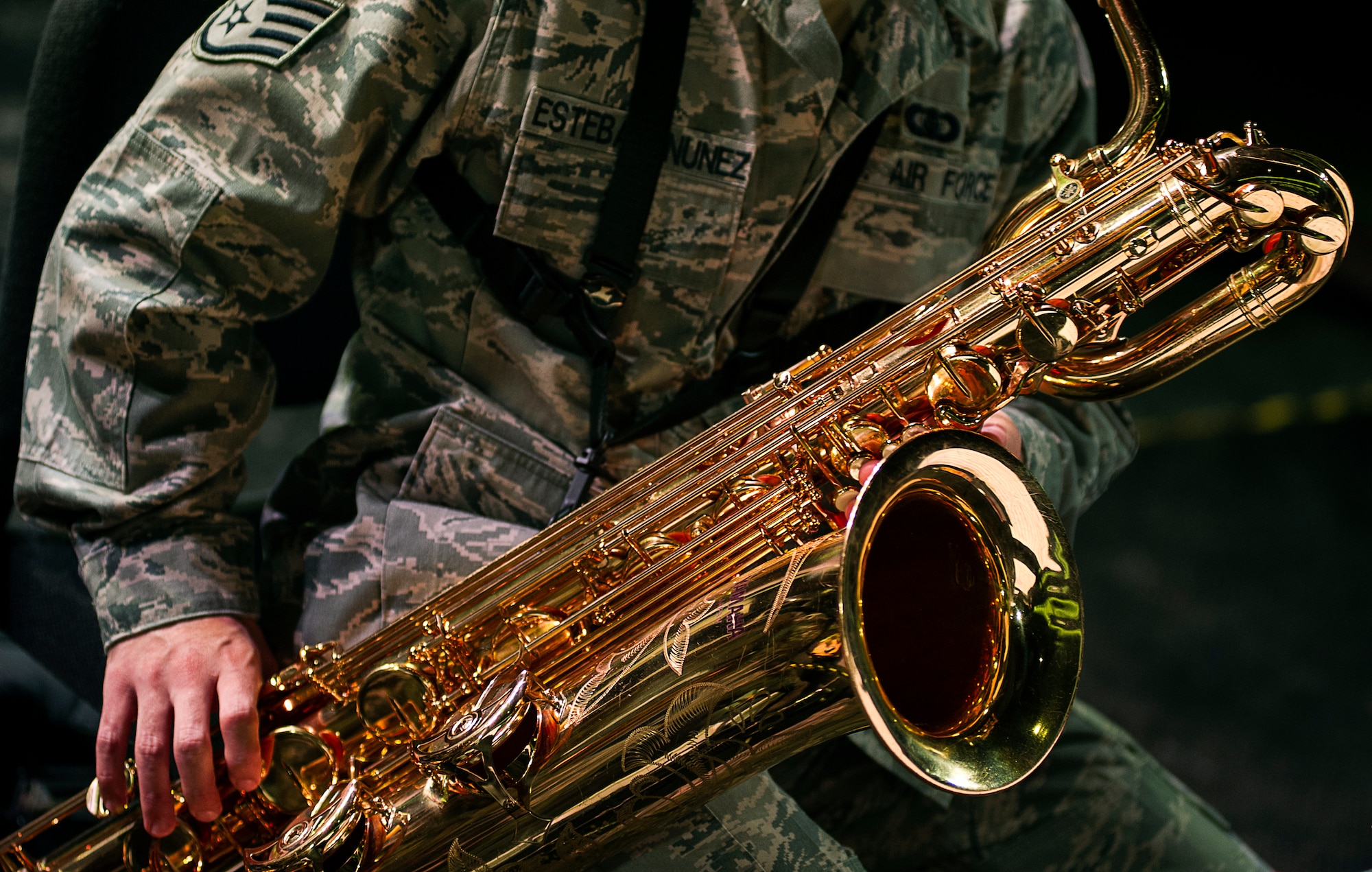 RAMSTEIN AIR BASE, Germany -- Staff Sgt. Lencys Esteban-Nunez plays saxophone during a rehearsal with the U.S. Air Forces in Europe Band jazz ensemble The Ambassadors at Ramstein Air Base, Germany Jan. 16, 2014. Esteban-Nunez learned to play saxophone during his childhood in Republic of Cuba before immigrating to the United States and joining the U.S. Air Force. (U.S. Air Force photo/Tech. Sgt. Benjamin Wilson)