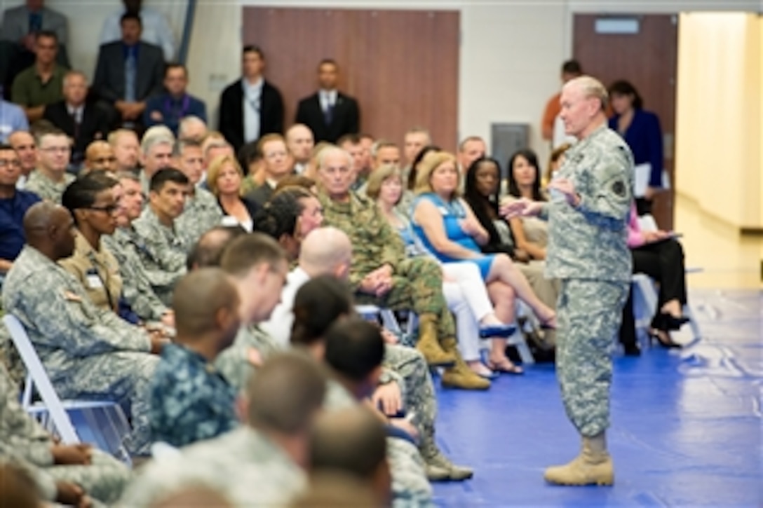 Army Gen. Martin E. Dempsey, chairman of the Joint Chiefs of Staff, speaks with members of U.S. Southern Command staff during a town hall meeting at the U.S. Army Garrison-Miami Family & MWR Fitness Center at U.S. Army Garrison-Miami, Doral, Fla., Feb. 10, 2014.