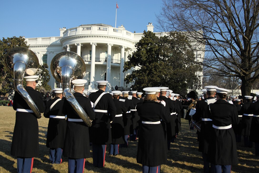 The Marine Band, led by Drum Major Master Gunnery Sgt. William L. Browne, performed for the State Arrival of His Excellency Francois Hollande, President of the French Republic on Feb. 11, 2014, on the South Lawn of the White House. (U.S. Marine Corps photo by MSgt Kristin S. duBois/released)