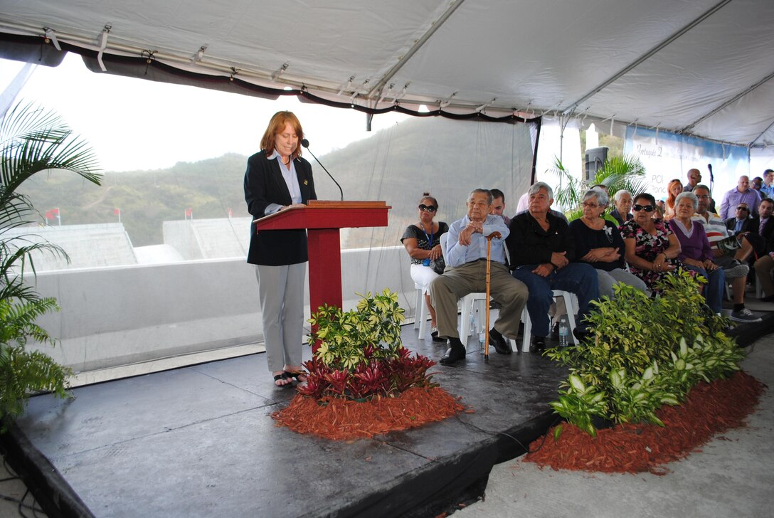Assistant Secretary of the Army (Civil Works) Jo-Ellen Darcy speaks at the dedication ceremony held on Feb. 5 to celebrate completion of construction of Portugues Dam near Ponce, Puerto Rico. The dam is the final component ofthe Portugues and Bucana flood risk project designed to reduce the impacts of flooding for people living in Ponce.  