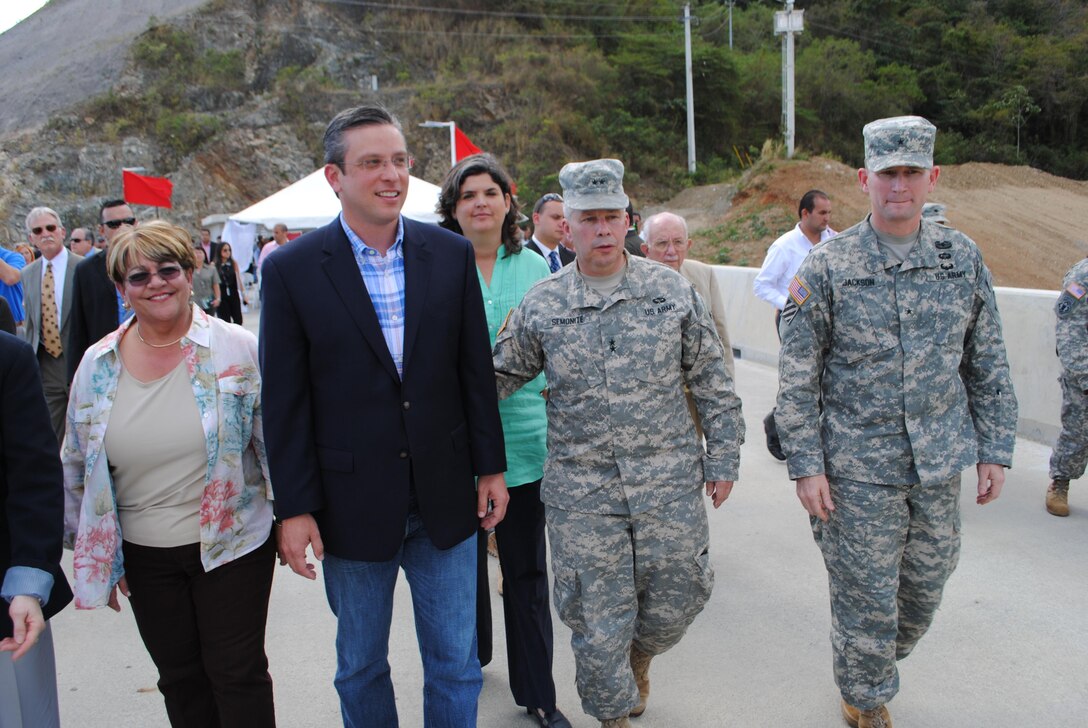 Maj. Gen. Todd Semonite (2nd from right) of the U.S. Army Corps of Engineers leads a VIP delegation on a tour of Portugues Dam near Ponce, Puerto Rico, following a dedication ceremony Feb. 5 celebrating completion of construction. Joining Semonite are (l to r) Ponce Mayor Maria Eloisa Melendez Altieri, Puerto Rico Governor Alejandro Garcia Padilla, Puerto Rico Secretary for Natural and Environmental Resources Carmen Guerrero Perez, and Corps of Engineers South Atlantic Division Commander, Brig. Gen. Ed Jackson. 