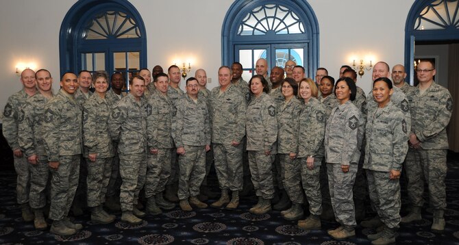 Air Force Chief of Staff Gen. Mark A. Welsh III poses for a photo with Air Force District of Washington chief master sergeant selects and new chief master sergeants during the chief orientation seminar at Feb. 7, 2014, at Joint Base Anacostia-Bolling, D.C. During the five-day event, attendees heard from Air Force senior leaders and discussed a range of topics from civilian personnel to being a resilient leader. (U.S. Air Force photo/Master Sgt. Tammie Moore)
