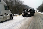 South Carolina National Guard wrecker crew assists state public safety officials during ice storm on Feb. 12, 2014.