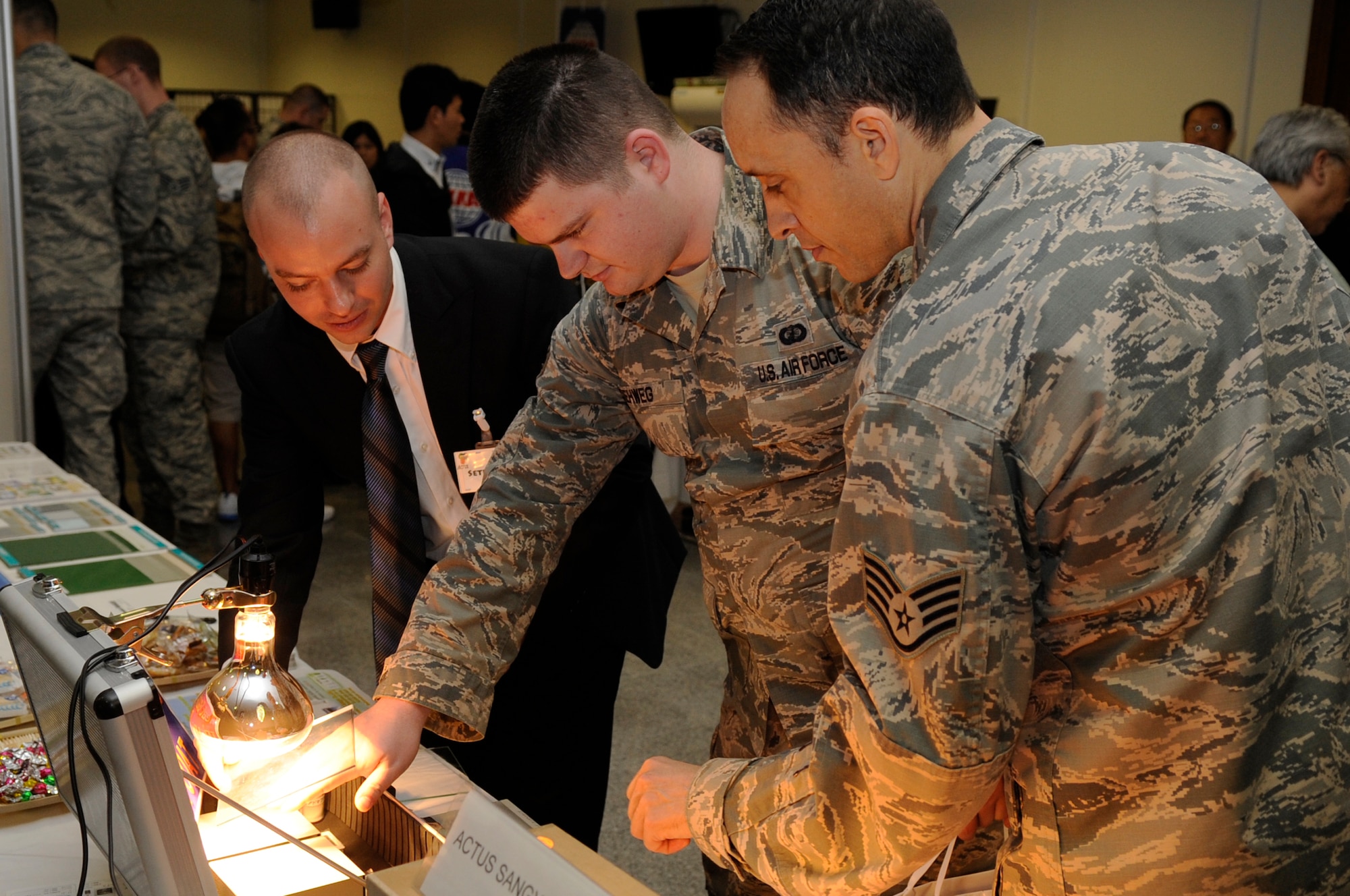 U.S. Air Force Government Purchase Card holders test out new products offered by local Okinawan companies during the fourth annual Okinawan First Vendor Showcase on Kadena Air Base, Japan, Feb. 6, 2014. The event allows unit resource advisors and military members a local source from which to purchase, and ensures Okinawan companies have the opportunity to display their products and services. (U.S. Air Force photo by Senior Airman Marcus Morris)

