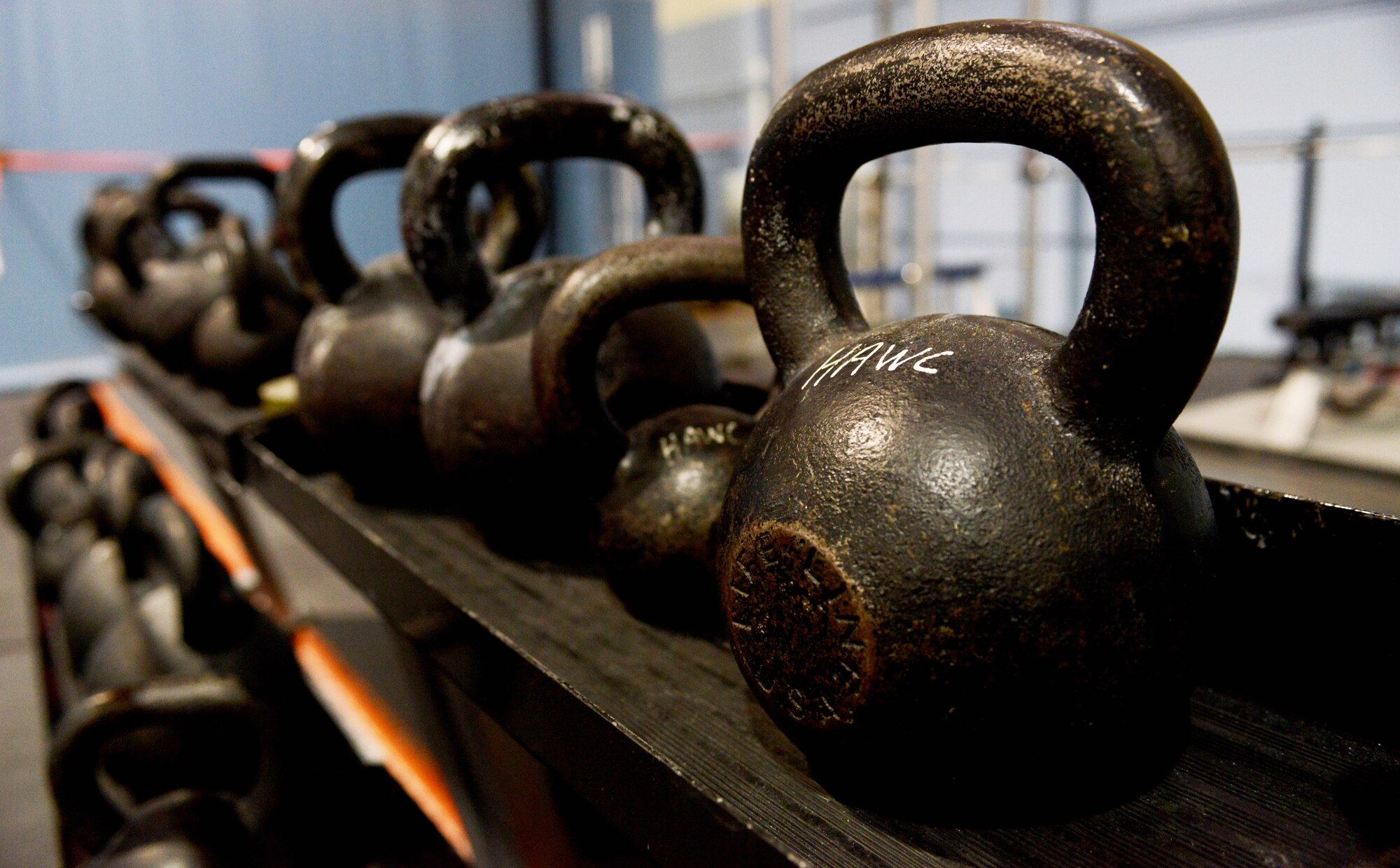 Kettlebells are gathered and prepared for the strongman competition, Feb. 6, 2014, on Mountain Home Air Force Base, Idaho.  Strongman Competitions, also known as strenght athletics, are a sport which tests competitors strength in a variety of catagories. (U.S. Air Force photo by Senior Airman Caitlin Guinazu/RELEASED)