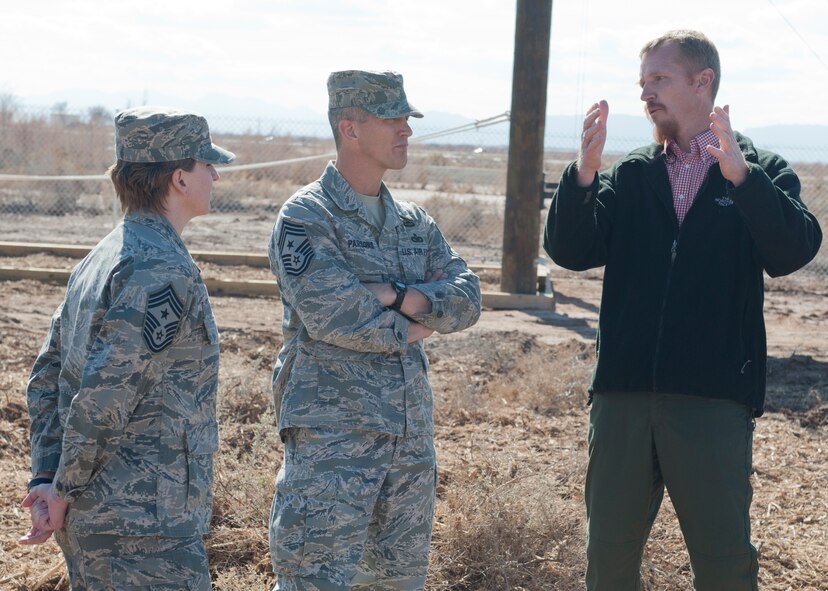 Chief Master Sgt. Richard Parsons, Air Combat Command command chief, briefs members of Team Holloman at the Domenici Fitness Center, Feb. 7. Parsons spoke about topics such as readiness, force shaping and the future direction of the U.S. Air Force. Parsons was invited to be the keynote speaker at the chief’s induction ceremony held later that day. (U.S. Air Force photo by Senior Airman Colin Cates/Released) 