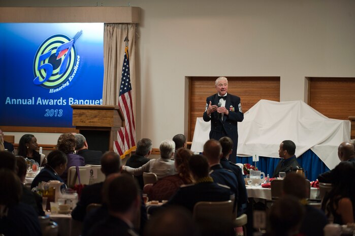 Retired Chief Master Sgt. of the Air Force Robert Gaylor speaks at the 57th Wing annual awards banquet at the Club Feb. 8, 2014, at Nellis Air Force Base, Nev. Gaylor was the fifth Chief Master Sgt. of the Air Force and is currently the oldest living Chief Master Sergeant of the Air Force. During his time in the Air Force, Gaylor served as a military policeman and advanced to the rank of master sergeant after only seven years and seven months of service. While serving as the Chief Master Sergeant of the Air Force, Gaylor helped secure a policy that allowed senior airmen to transport their families at government expense during permanent change of station moves, a significant move in improving troop quality of life. (U.S. Air Force photo by Airman 1st Class Thomas Spangler)