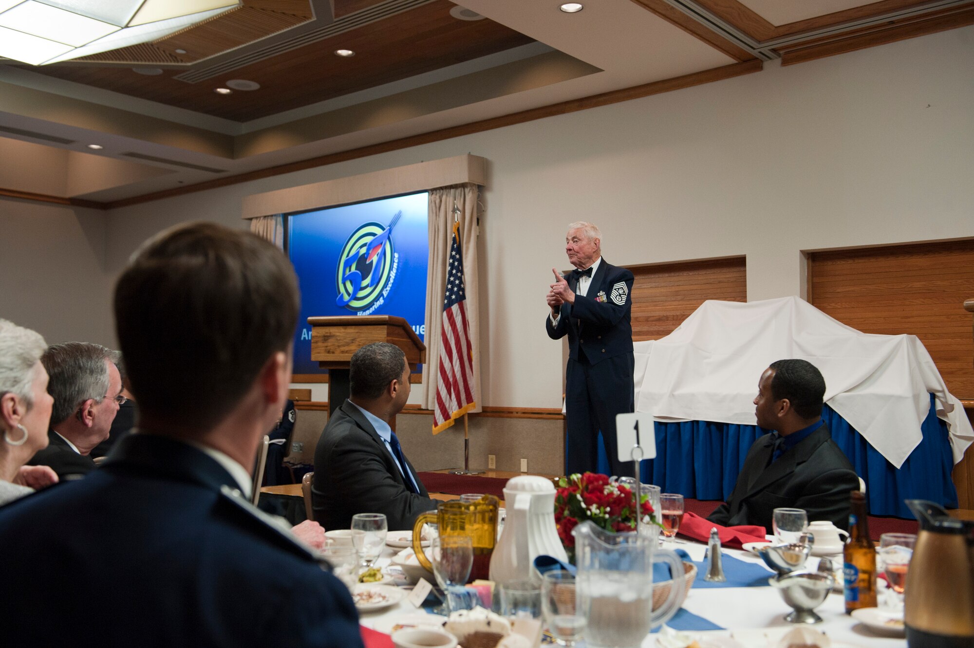 Retired Chief Master Sgt. of the Air Force Robert Gaylor speaks at the 57th Wing annual awards banquet at the Club Feb. 8, 2014, at Nellis Air Force Base, Nev. Gaylor regularly speaks to Airmen on how they can become the best Airmen they can be. While serving as the Chief Master Sergeant of the Air Force, Gaylor addressed low morale and the weak public image of the military head on. (U.S. Air Force photo by Airman 1st Class Thomas Spangler)