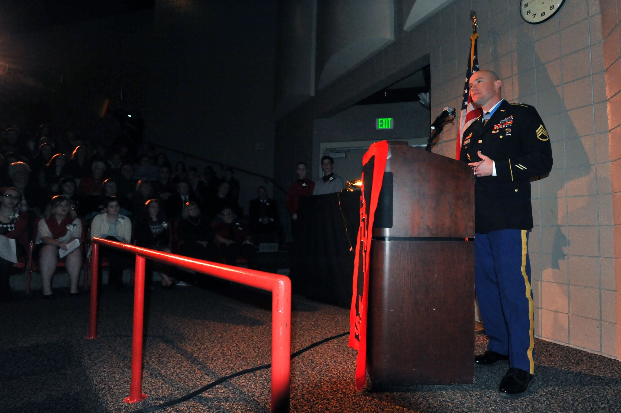 U.S. Army Staff Sgt. Ty Carter, talks to students while he was recognized as this year’s distinguished alumnus Feb. 7, 2014, during the annual Red and Black Convocation at North Central High School in Spokane, Wash. Carter, a graduate of the high school from the class of 1998, received the Medal of Honor from President Barack Obama at the White House in August 2013, for his valor and actions on the battle field in Afghanistan. (U.S. Air Force photo by Staff Sgt. Veronica Montes/Released)