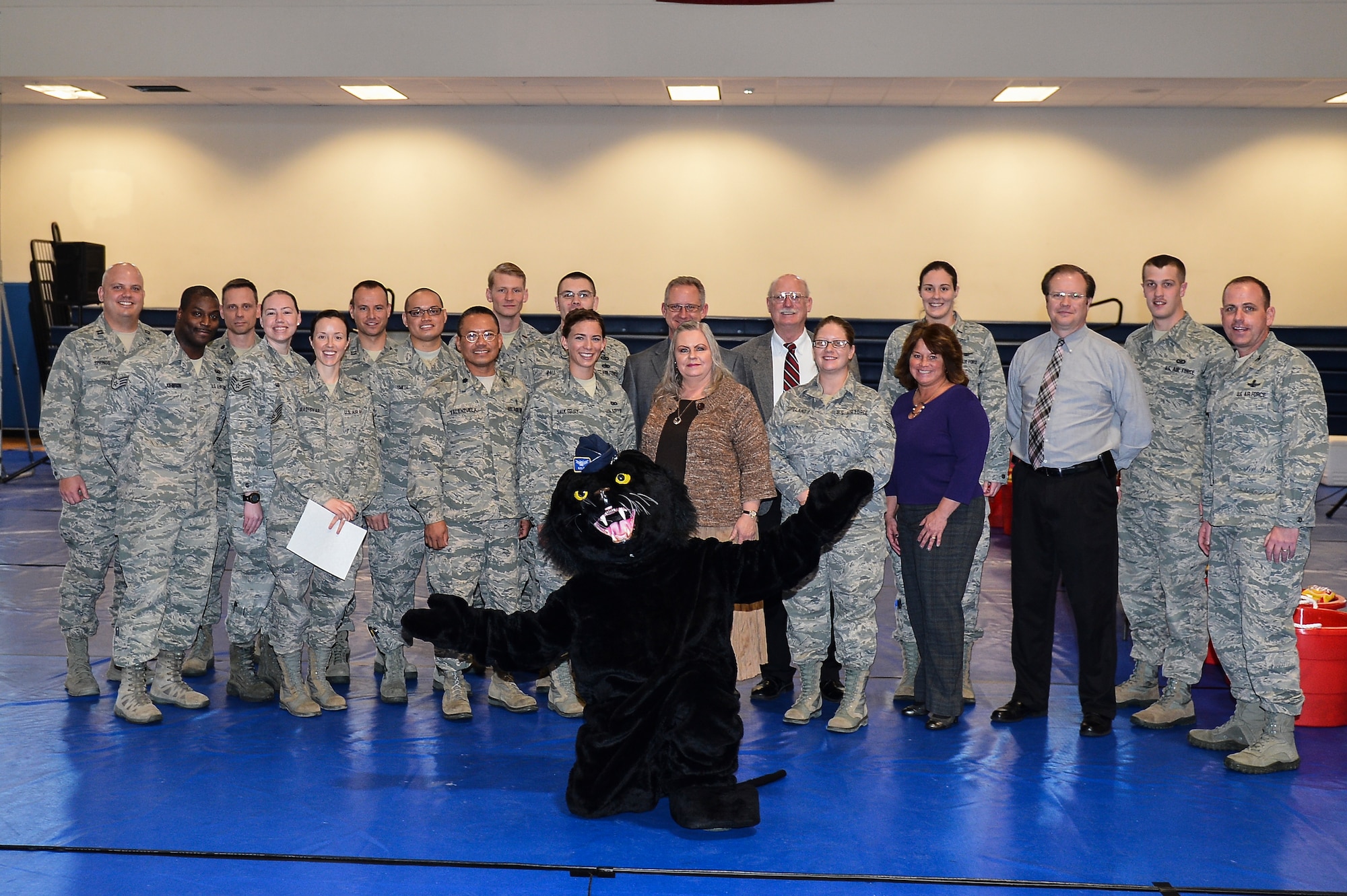 Members of the 460th Space Wing Staff received Unit Effectiveness Inspection Professional Team and Professional Performer awards during the commander’s call and UEI out brief Feb. 10, 2014, at the fitness center on Buckley Air Force Base, Colo. These individuals and teams received the awards for demonstrating exceptional performance and teamwork.  (U.S. Air Force photo by Senior Airman Riley Johnson/Released)
