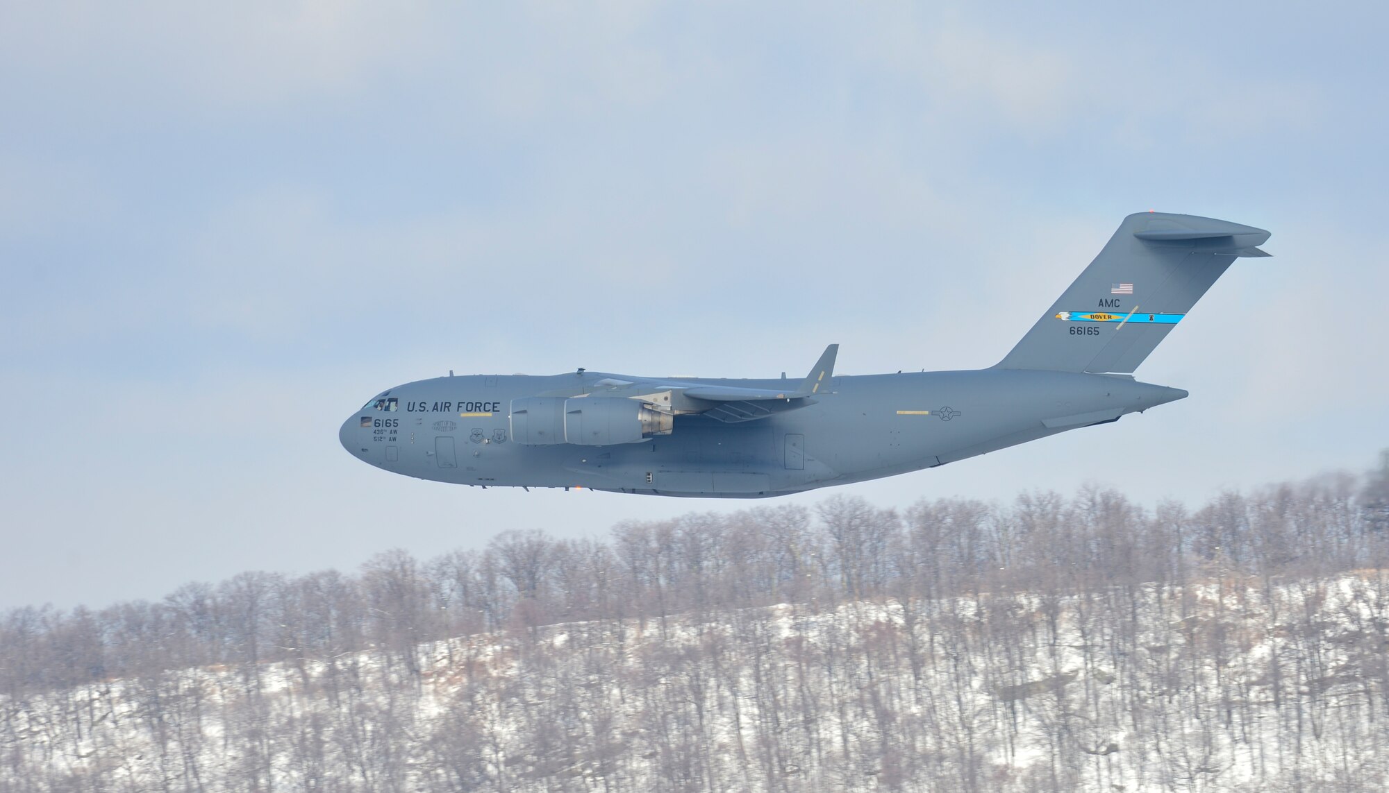 A C-17A Globemaster III from Dover Air Force Base, Del., performs low-level flying techniques at Bollen Live-Fire Range Feb. 6, 2014, at the Bollen Live-Fire Range Complex on Fort Indiantown Gap, Pa. The C-17 was piloted by an Air Force Reserve crew from the 326th Airlift Squadron at Dover AFB. (U.S. Air Force photo/Airman 1st Class William Johnson)