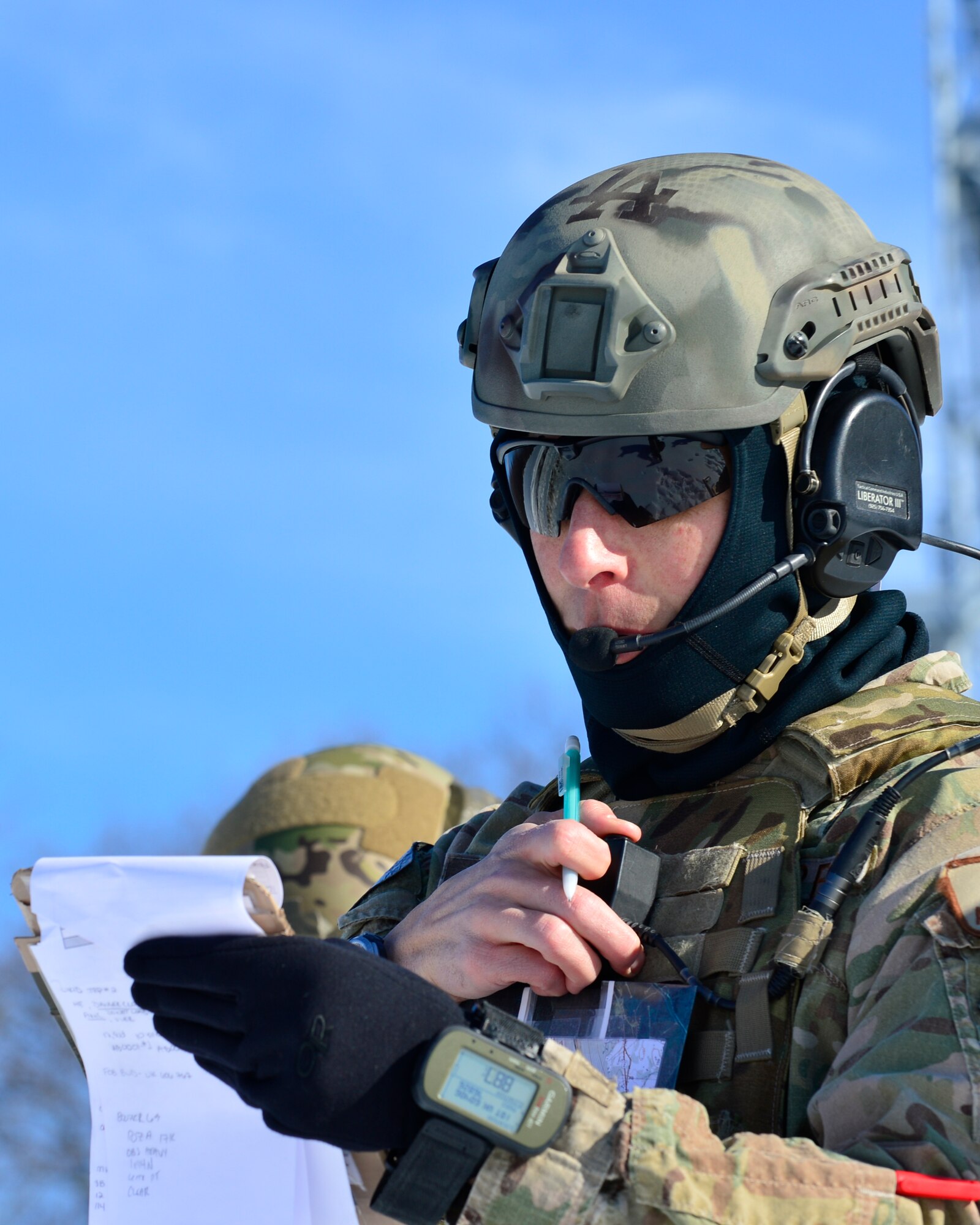 Staff Sgt. Steven Stein, 11th Air Support Operations Squadron joint terminal air controller from Fort Hood, Texas, communicates targeting coordinated to an A-10C Thunderbolt II during a live-fire training exercise Feb. 6, 2014, at the Bollen Live-Fire Range Complex on Fort Indiantown Gap, Pa. Stein directed the A-10C Thunderbolt II to engage multiple armored personnel carriers with 30 millimeter training rounds on the Bollen Range. (U.S.  Air Force photo/Airman 1st Class William Johnson)