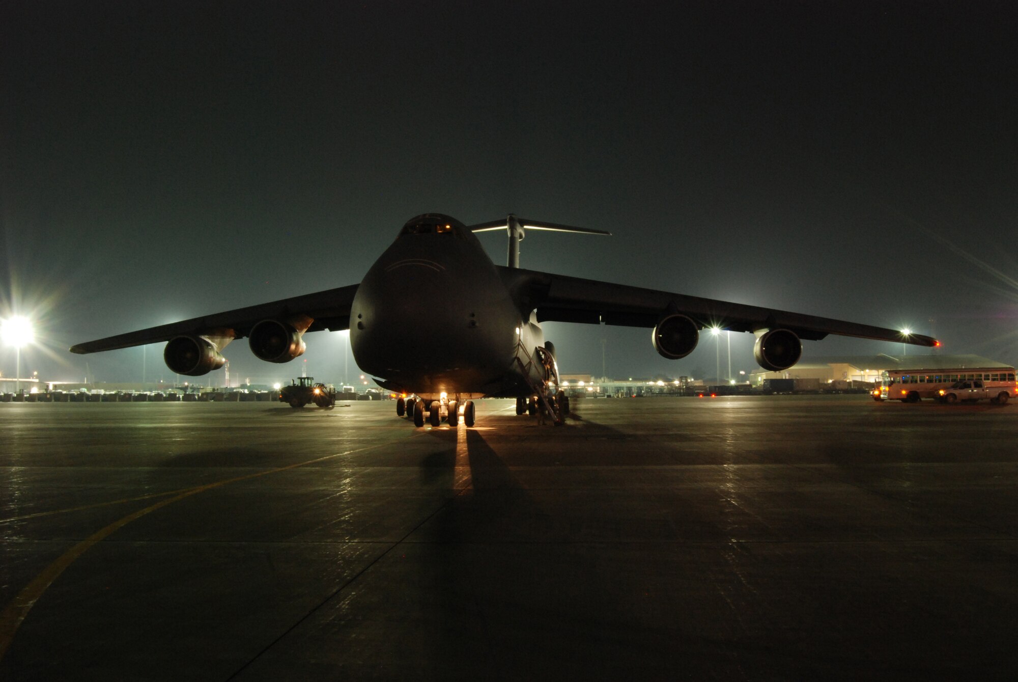 A C-5B Galaxy is parked on the flight line ramp at Bagram Airfield, Afghanistan, Feb. 11, 2014. The C-5 is the Department of Defense’s largest military aircraft and is often used to oversized cargo. (U.S. Air Force photo by Capt. Brian Wagner/Released)