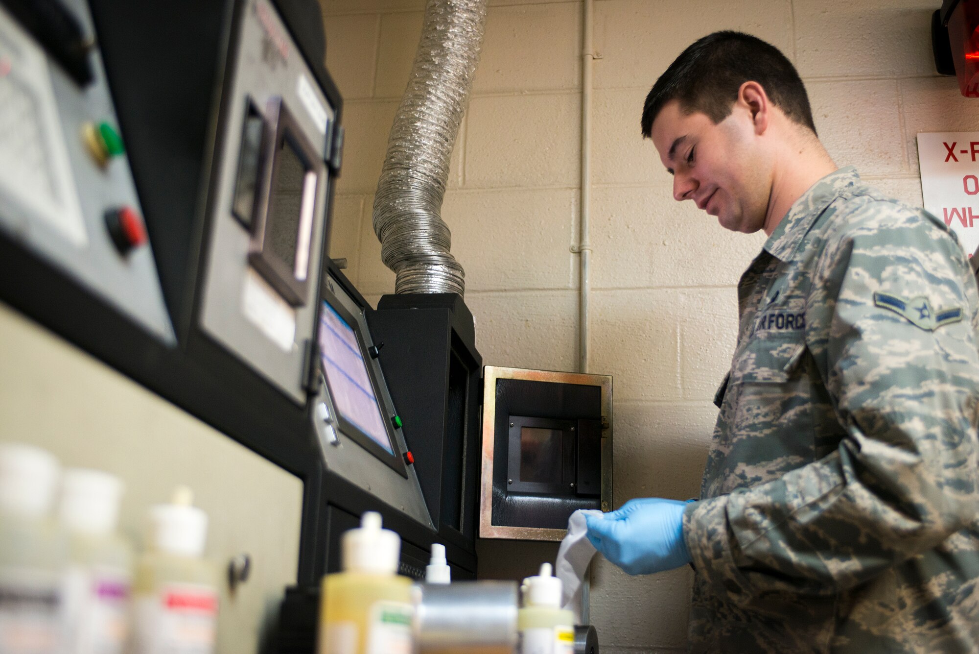 U.S. Air Force Airman Nicholas Burgess, 23d Equipment Maintenance Squadron non-destructive inspection apprentice, correlates a Joap oil testing machine at Moody Air Force Base, Ga., Feb. 11, 2014. The Joap machine undergoes monthly calibrations to ensure proper test results. (U.S. Air Force photo by Airman 1st Class Ryan Callaghan/Released)
