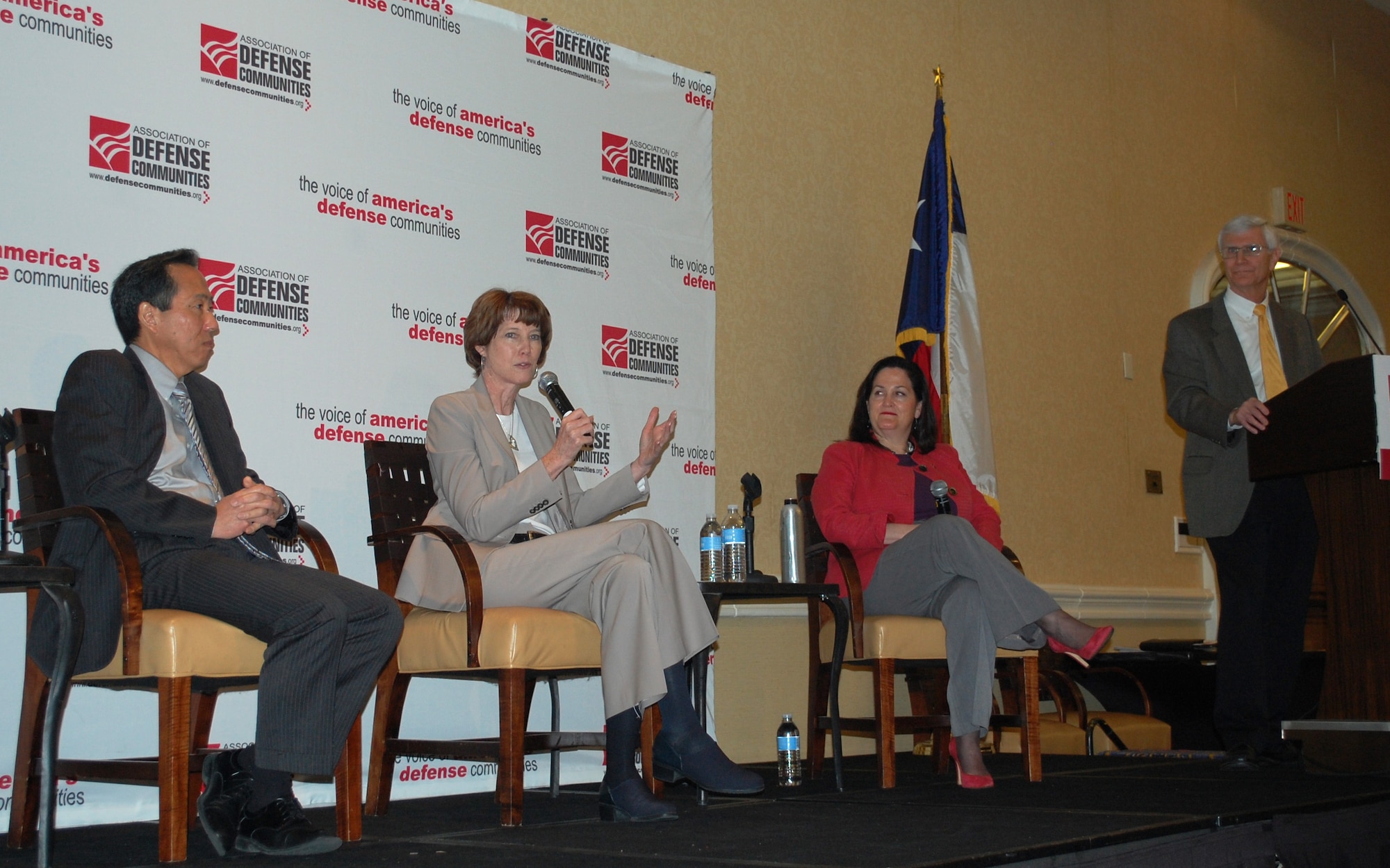 SAN ANTONIO, Texas -- At center, Kathleen Ferguson, acting assistant secretary of the Air Force for installations, environment and logistics, and her counterparts from the Navy, Roger Natsuhara, and the Army, Katherine Hammack, participate in a panel discussion during the Association of Defense Communities Installation Innovation Forum here Feb. 11. The panel discussed issues impacting defense communities and future partnership opportunities for the military and defense communities. (U.S. Air Force photo/Shannon Carabajal)