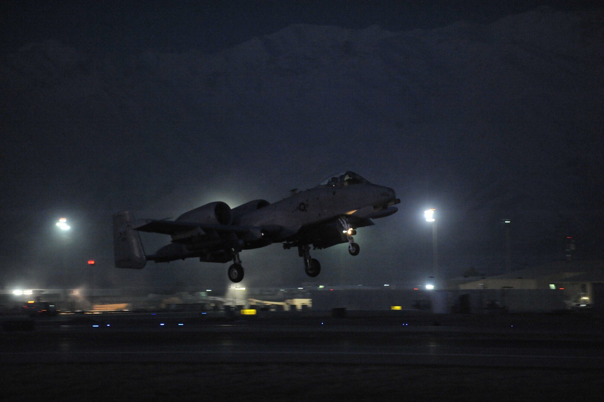 A U.S. Air Force A-10 Thunderbolt II receives a final check before taking off on a pre-dawn mission from Bagram Airfield, Afghanistan, Feb. 11, 2014. The aircraft and crews at Bagram are prepared to fly 24 hours a day. (U.S. Air Force photo by Senior Master Sgt. Gary J. Rihn/Released)