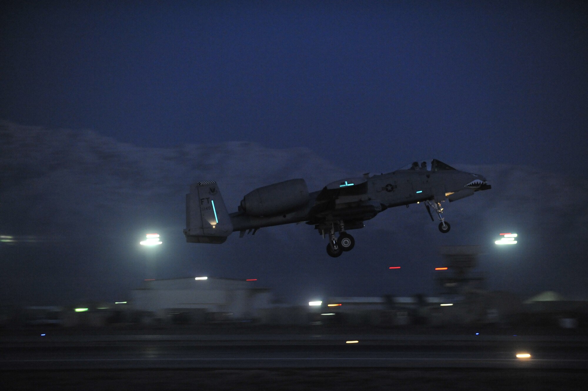 A U.S. Air Force A-10 Thunderbolt II takes off on a nighttime mission from Bagram Airfield, Afghanistan, Feb. 11, 2014. The aircraft and crews at Bagram are prepared to fly 24 hours a day. (U.S. Air Force photo by Senior Master Sgt. Gary J. Rihn/Released)